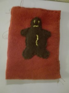 Rotes-Kissen mit Lebkuchenmann Konrat.jpg